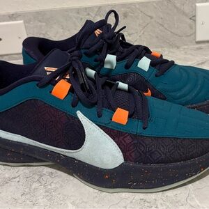 Nike Athletic Shoes in Navy and Teal with Orange Accents